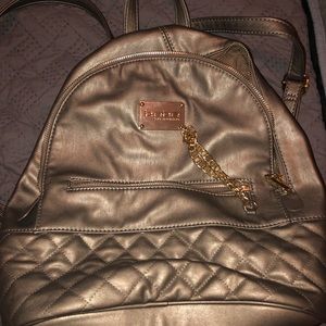 Bebe backpack goldish bronze color